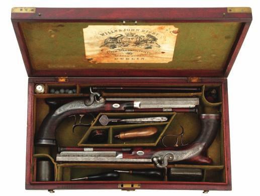 449 449 A PAIR OF PERCUSSION SAW-HANDLED DUELLING PISTOLS BY WILLIAM & JOHN RIGBY, NOS 7818 AND 7819 FOR 1835 with signed etched twist octagonal sighted barrels, engraved case-hardened breeches