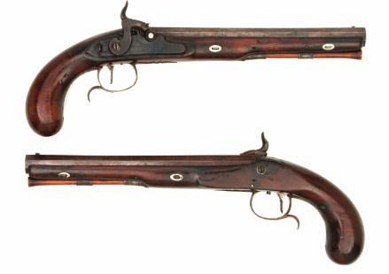 133 133 A PAIR OF PERCUSSION DUELLING PISTOLS BY WOGDON & BARTON, CIRCA 1795-1803 each converted from flintlock, with rebrowned swamped octagonal sighted barrel, engraved breech tang incorporating