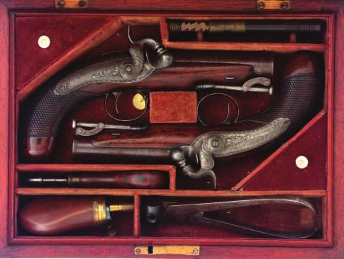 134 134 A PAIR OF IRISH PERCUSSION TRAVELLING PISTOLS BY TRULOCK & SONS, DUBLIN, CIRCA 1830 with signed browned twist sighted barrels, engraved casehardened breeches, engraved case-hardened breech