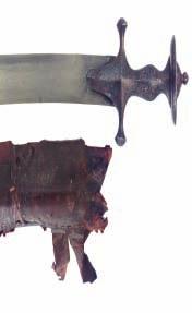 1 2 3 1 AN INDIAN TALWAR, 18TH CENTURY with curved single-edged watered steel blade (small areas of pitting), steel hilt of characteristic form, and decorated over its full surface in silver with