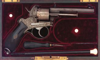 177 177 A BOHEMIAN SIX-SHOT PIN-FIRE REVOLVER BY LEBEDA A PRAGUE, CIRCA 1860 with signed octagonal barrel engraved with linear frames on each face and fitted with blued fore-and back-sight, engraved