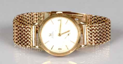 61-71 Luxury Wrist Watches 17 68 Gents 9 carat gold Omega wrist watch, cream face with gilt hour batons, subsidiary second dial,