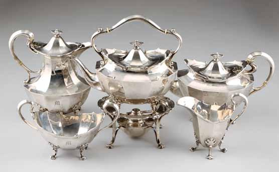 12ozs 240 Five piece silver tea service, faceted form raised on scroll feet comprising of