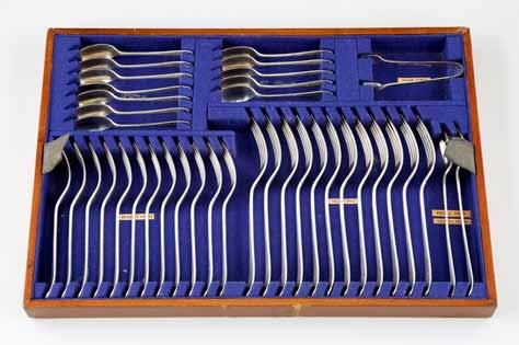 44 Silver 159-247 Thomas R Callan Ltd Lot 245 Lot 246 Lot 247 245 Mahogany canteen of silver cutlery, Assay marked Sheffield 1930/31 First Tier: Bone handled fish knives and forks, silver blades 12