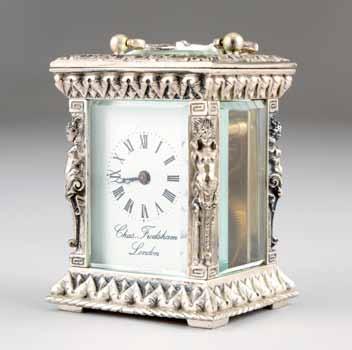 267-276 Clocks 49 Lot 272 Lot 273 272 Boxed silver carriage clock by Charles Frodsham & Co.