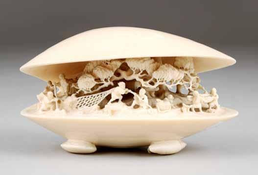 condition) 1800-2400 (+ 21% BP*) 278 19th / 20th Century Japanese ivory bivalve shell fish, the shell is open revealing a carved landscape with trees and figures, signed to base. 13.