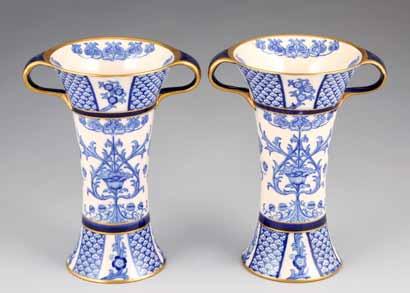online catalogue or refer to catalogue appendices 309 Pair of MacIntyre vases, flared form with looped handles, blue and white