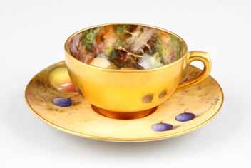 11cm diameter 13 Royal Worcester coffee cup and saucer, hand painted with fruit in a naturalistic background, signed