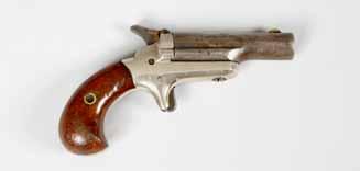 41 Derringer rimfire, pocket pistol, spur trigger, swivel barrel, engraved Colt, 12cm long.