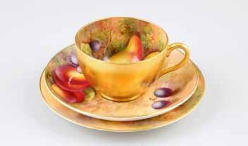 1-60 Royal Worcester 7 Lot 18 18 Royal Worcester scallop rimmed cup and saucer, hand painted with fruit in a naturalistic background,