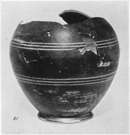 A GEOMETRIC HOUSE AND A PROTO-ATTIC VOTIVE DEPOSIT 557 29. (P535) Figs. 13 and 15 Fragmentary small jug with one handle, decorated with lines and dots. H. 0.054 m.; d. 0.057 m.