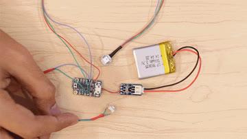 The arduino code should already be uploaded to the Adafruit Trinket