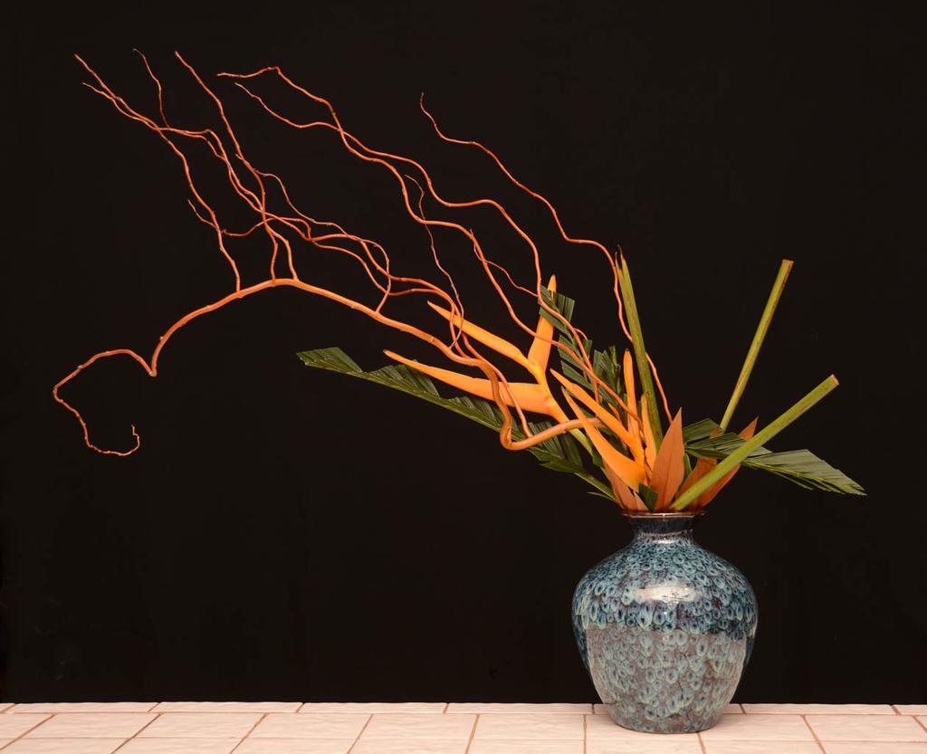 It adds a kind of wild and dramatic element into our floral art.