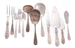 $300-500 438 Miscellaneous coin silver fiddle spoons 11 spoons, 1160 ozt tw Est $200-400 439 8 Kirk sterling silver water goblets seven of model 72, and one model 4105, 6 3/4 in H, no monograms, 4050