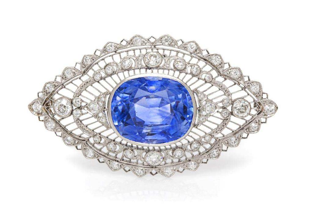 Bailey, Banks & Biddle Lot 67 An Edwardian Platinum, Sapphire and Diamond Brooch, Bailey, Banks & Biddle, Circa 1910, of navette form in an open filigree work design, containing one oval mixed cut