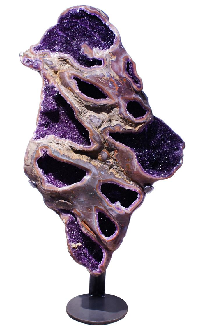 MULTI-OPENING AMETHYST GEODE This amazing multi-orphused amethyst geode brings you into another dimension.