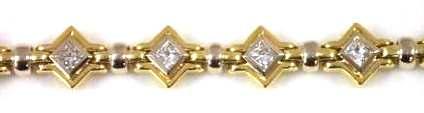 7 length with eleven princess cut diamonds, approximately 3.30 carats. Certificate of appraisal is attached.