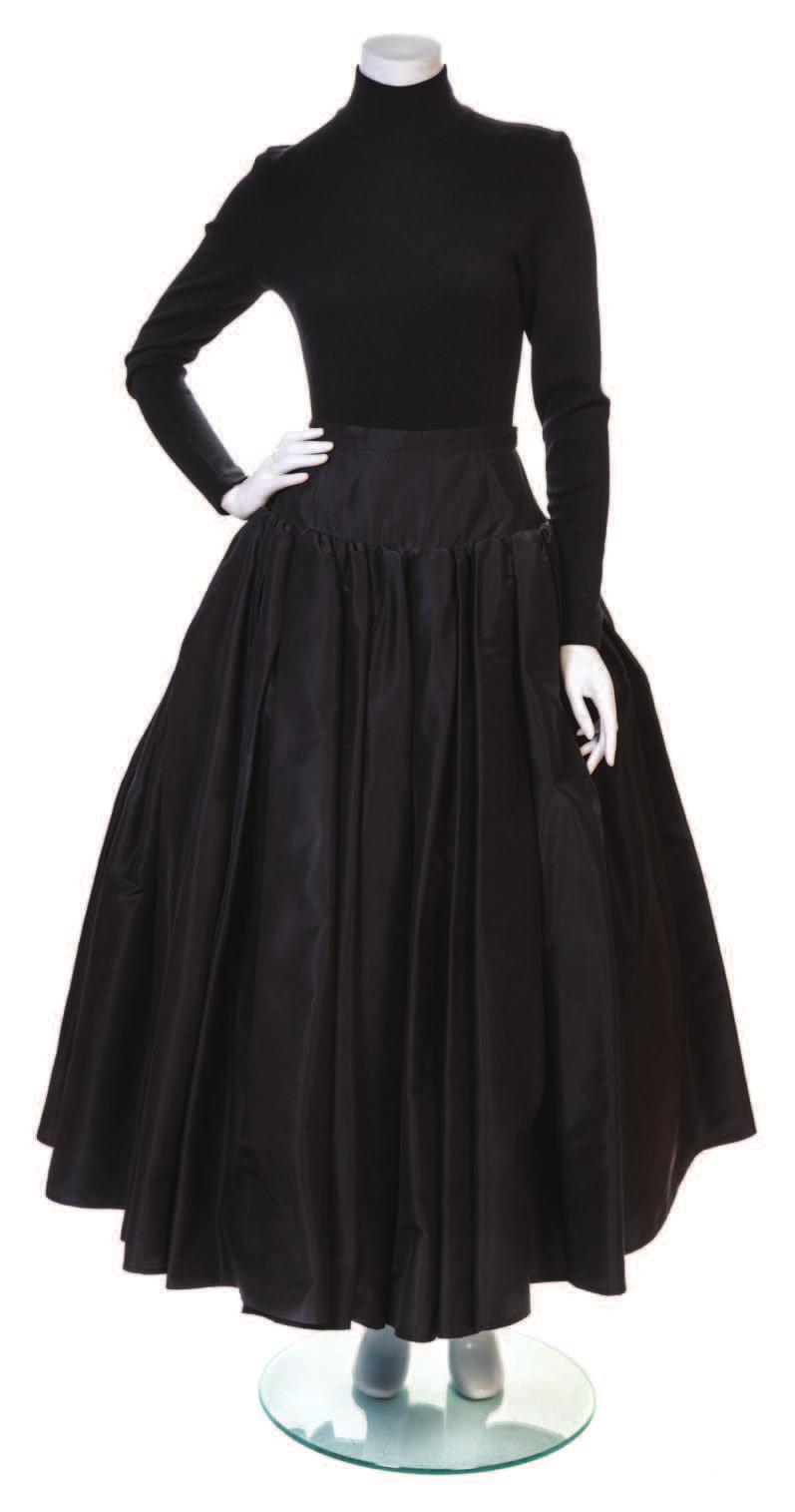6 A Giambattista Valli Black Tweed Dress, with a crew neckline, cap sleeves, a decorative contrasting black hem and a back zip closure. Labeled: Giambattista Valli. Size 40.