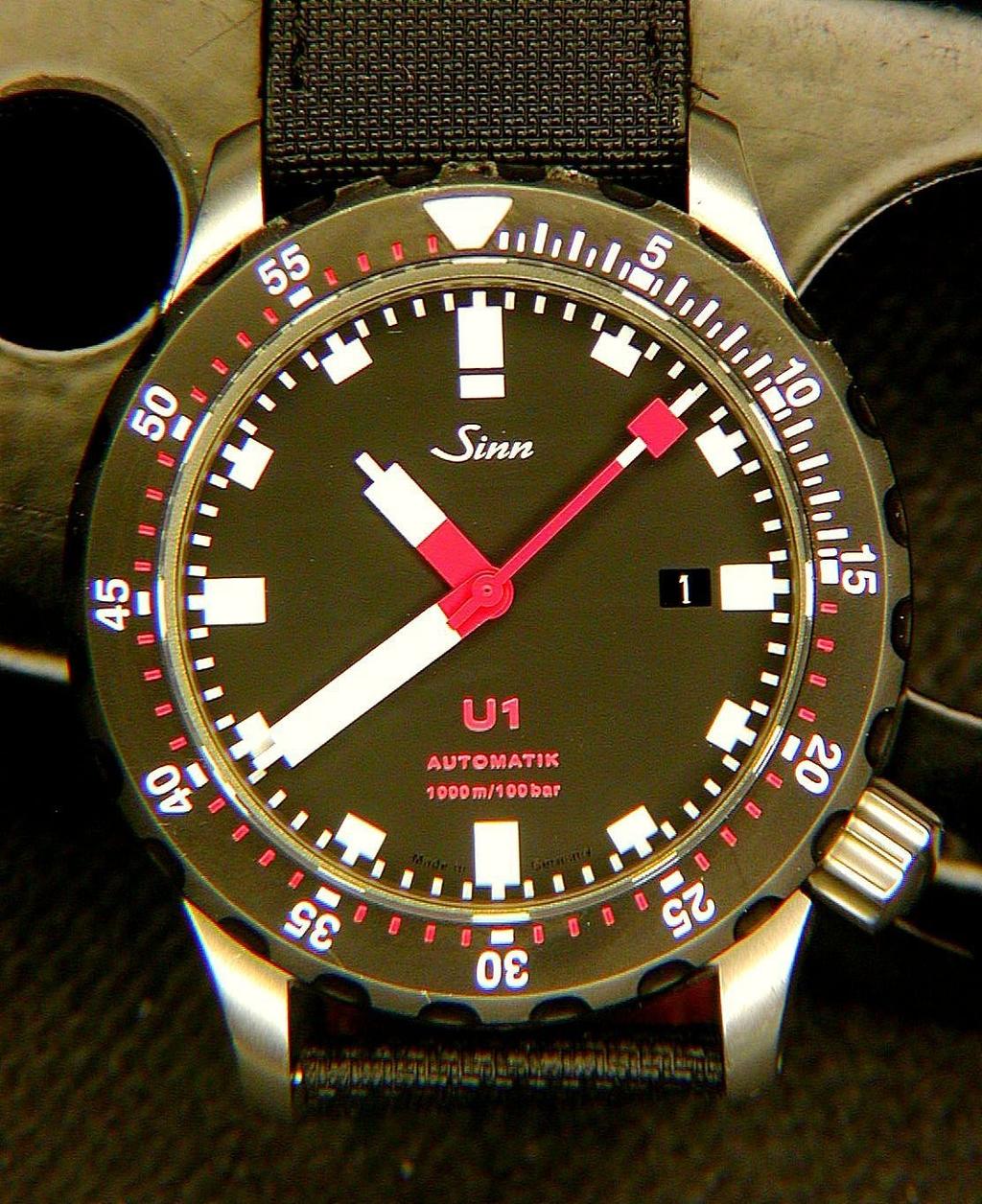 Then apply thread locker and gently tighten the screws. All back together now, it should look like this. 2011 rationaltime There is something satisfying about the construction of the Sinn U1 bezel.