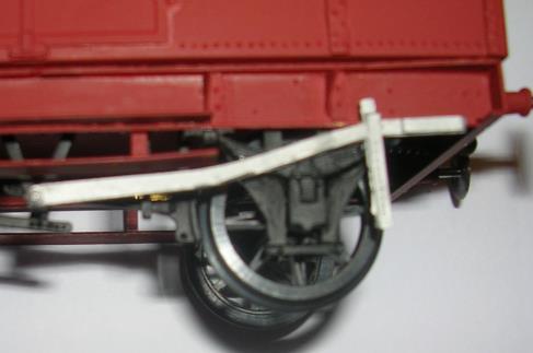 Place the brake gear casting (part 22) against the inside of solebar and slide down into the chassis with the spigot pointing outward.
