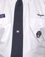 Aviation badges are worn 1/2 above pocket or ribbons if worn; bottom