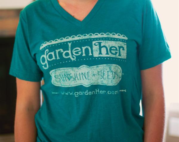 Item No. 127 GardenHer Sunshine + Seeds Tank Wholesale Price: $12 USD; $14USD for XXL Imprint reads: GardenHer.