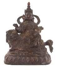 588 590 598 589 588 A Sino-Tibetan Parcel-Gilt Bronze Figure of Buddha the igure depicted seated on a single lotus base with the left hand in dhyanasanamudra and the right hand lowered touching the