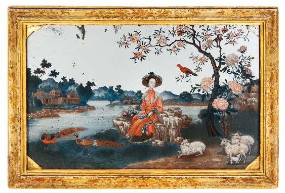 717 716 A Chinese Export Reverse Painted Glass Panel 19TH CENTURY depicting three children performing a dragon dance, accompanied by a child with a fan and two children with musical instruments in an