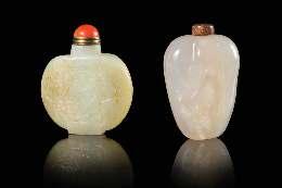 735 736 737 738 739 740 735* A Carved White Jade Snuf Bottle 18TH/19TH CENTURY the mottled white stone with minor inclusions, of rounded rectangular form and supported on a short foot, the front