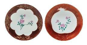 $700-900 268 A Grisaille Painted Porcelain Dish of circular form, painted to the interior with a mountainous landscape, the underside bearing a Qianlong six-character iron red mark. Diameter 9 inches.