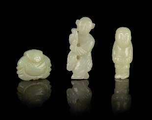 304 309 307 301 Three Carved Jade Articles 18TH/19TH CENTURY comprising of two celadon jade carvings, the irst showing double badgers each bearing a ruyi spray in the mouth, the second depicting a