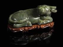 , Chicago, Illinois, December 13, 1971 $6,000-8,000 325 A Carved Pale Jade Figure of a Quail 18TH/19TH CENTURY the animal igure depicted seated with all four tucked underneath, the body with inely