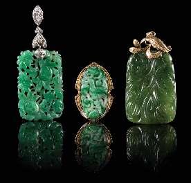 Property from a Private Collection, Park Ridge, Illinois $300-500 351 354 353 Four Precious Stone Pendants the irst of spinach jade with incised decoration with sterling silver mounts, the second of