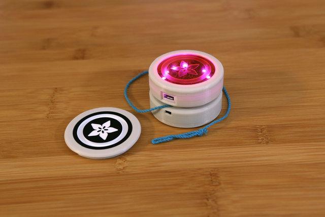 The NeoPixel LEDs can shine through the cover, making cool glowy effects.
