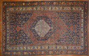 rug, approx 36 x 54 Iran, circa 1970 Est $1,000-1,500 1030 Persian Kerman carpet, approx 97 x 13 Iran, modern Est $400-600 1031 1032 Silk Goum rug, approx 45 x