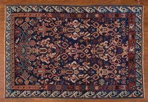 Persia, circa 1900 Est $4,000-6,000 Antique Kazak rug, approx 41 x 910 Caucasus, circa 1900 Est $4,000-5,000 1063 Silk Goum rug, approx 37 x 511 Iran, circa 1980