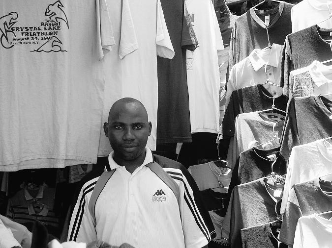 Geofrey Milonge at His T-Shirt Stall at the
