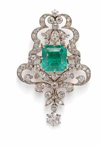 649 Edwardian Emerald and Diamond Pendant/ Brooch, set with a square emerald-cut emerald measuring approx. 12.10 x 11.70 x 8.60 mm, and weighing approx. 8.00 cts.