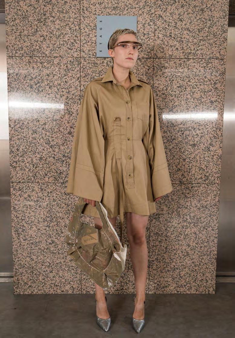 LOOK 9 SS1809D04 DECONSTRUCTED SHIRT DRESS DECONSTRUCTED SHIRT DRESS WITH SKIRT INSERTED IN BLOUSE WITH VENTS ON SLEEVES. PLACKETS ON SLEEVES TURNING INTO BUTTON ABLE EPAULETTES.