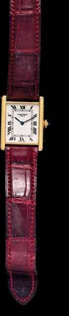 7 8 6 6 A Stainless Steel and 18 Karat Yellow Gold Ref. 1567 Santos Wristwatch, Cartier, 35.00 x 24.