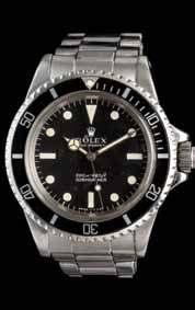 80 79 79 A Stainless Steel and Yellow Gold Ref. 16803 Submariner Wristwatch, Rolex, Circa 1984, 40.