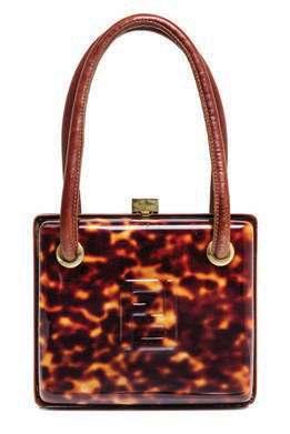 277 auction HIGH LIGH TS 278 283 277* A Fendi Hardsided Evening Bag, with logo molded to the front, double brown leather