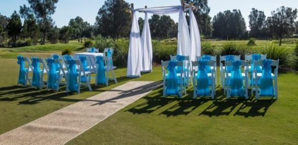 Bamboo Arbor Ceremony Bamboo arbor with white chiffon draping 18 white Americana chairs with sashes choice of red, black, pink, royal blue or purple carpet or