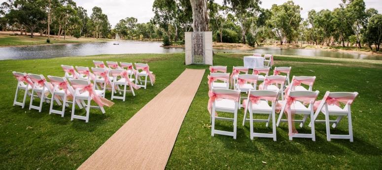 signing table 1 seagrass aisle runner 1 pallet sign $810 Floral Dreams Ceremony 34 white Americana chairs