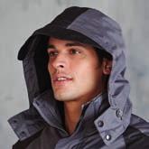 Outer jacket has collar high full zip with studded storm flap. Fleece lined collar. 4 front zip pockets with storm flaps.