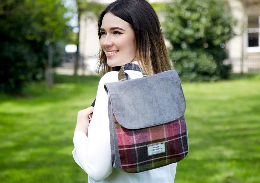 Raspberry Tweed Backpack JEWELLERY ROLL Effortlessly combining style and practicality, the Tweed Jewellery Roll is packed with features including a large pouch, three zipped pockets and a ring roll.