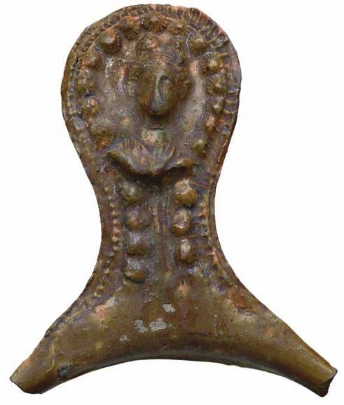 on the backside indicates that person holds vexillum or signum in the left hand, while the front side of the handle edge could represent a scepter. Unpublished. Singidunum Fig. 6.