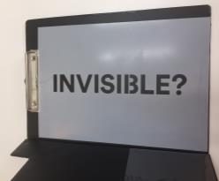 Lift the stencil to reveal the word INVISIBLE? Wipe the stencil to ensure non-branded aerosol residue is removed 4.