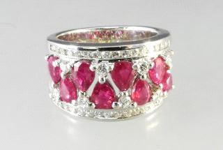 $500 - $700 Lot # 429 Lot # 422 422 Lady's 14k white gold, diamond and ruby ring.