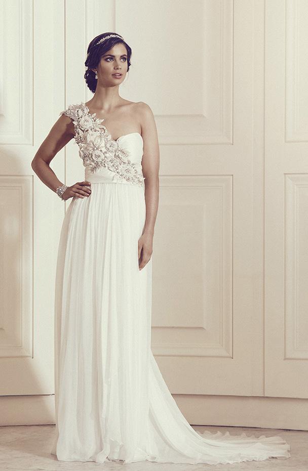 B R O C A D E The cascading silk chiffon folds of the brocade skirt is perfect for our brides who like a little